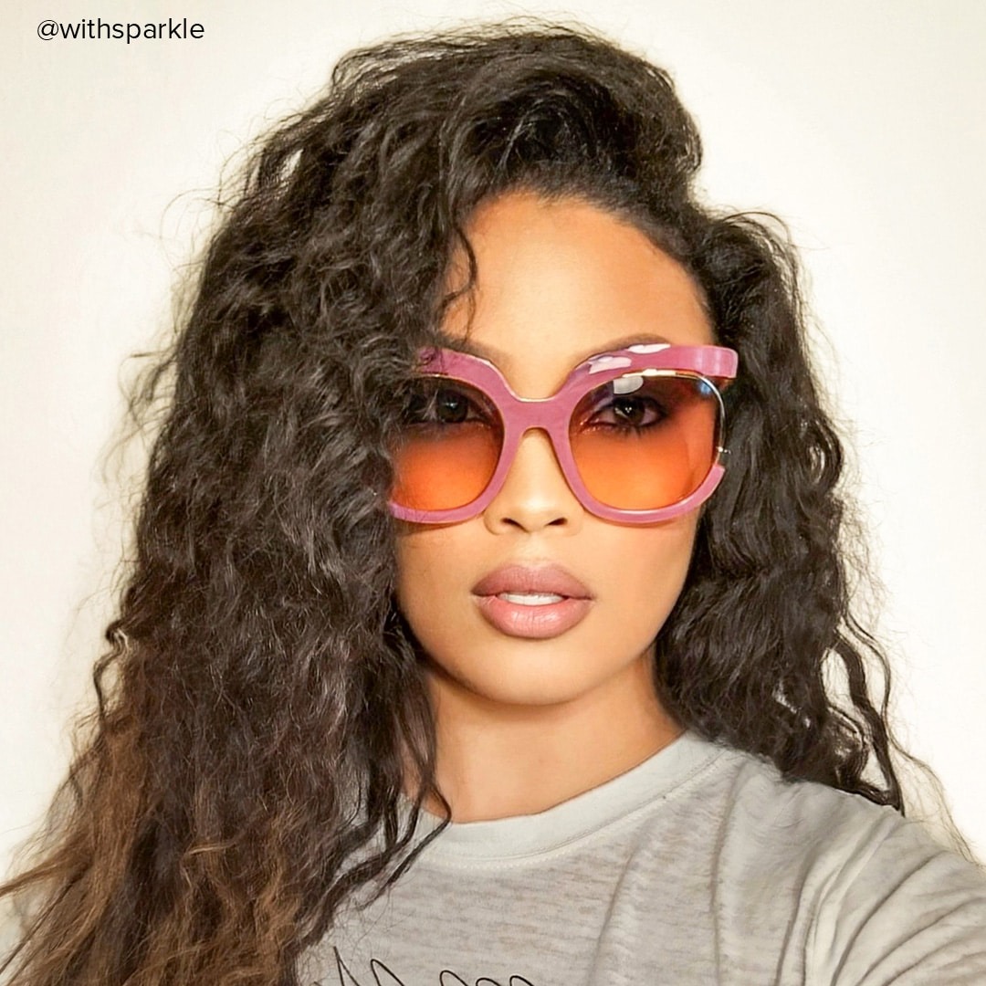 A women wearing oversize frame glasses buy eye glasses called Fredia from Vooglam