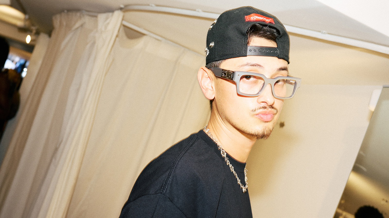 tombogo wearing vooglam limited designer glasses