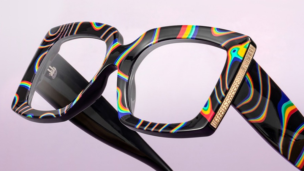 Close-up of a pair of multicolored, rectangular eyeglasses.
