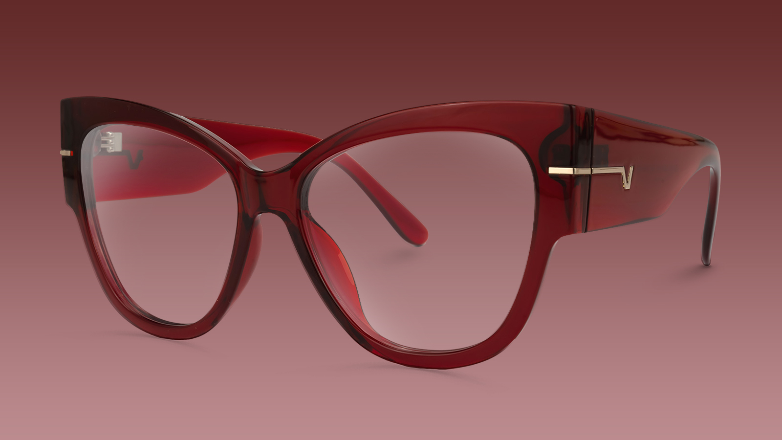 A pair of oversized butterfly sunglasses in a rich burgundy color, showcasing one of 2026's hottest color trends.