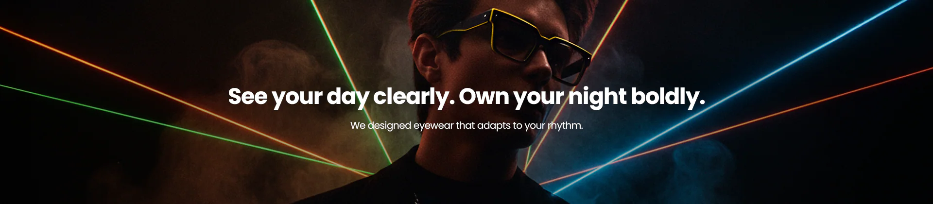 Vooglam 'Music × Style' campaign banner featuring a person wearing stylish glasses amidst festival laser lights. Text reads: 'See your day clearly. Own your night boldly. We designed eyewear that adapts to your rhythm,' highlighting day-to-night prescription ravewear.