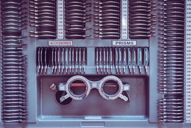 A selection of eyeglass lenses and prisms organized in a display case