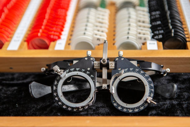 The black and silver frame features adjustable dials around the lens openings, marked with various degrees and measurements.